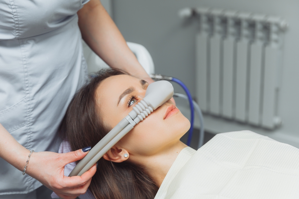Comfortable Dental Sedation Care for Relaxed Patients - Dentist in Madison TN Patient resting calmly in the dental chair while receiving comfort-focused care with nasal sedation - Dentist in Madison TN